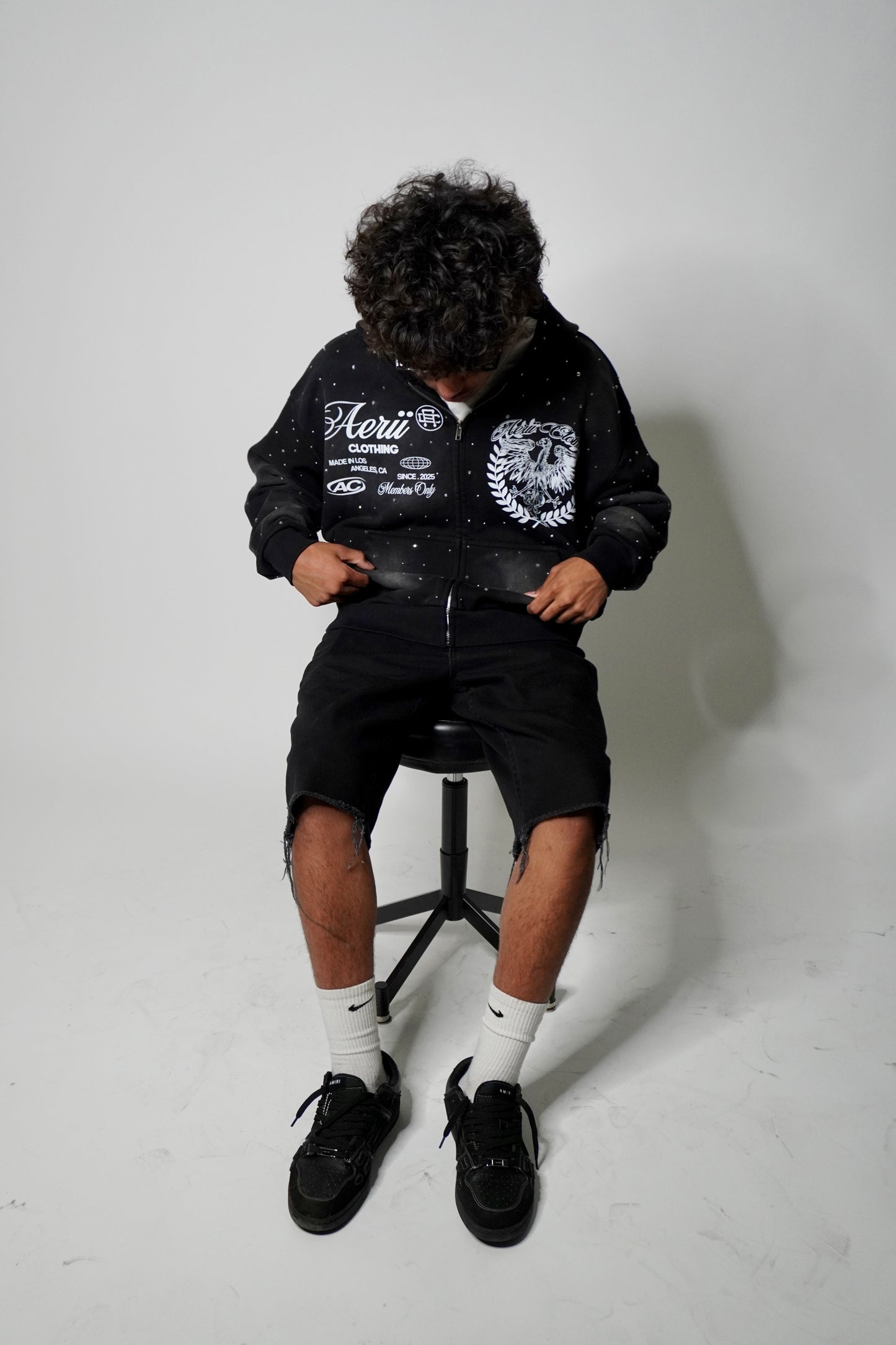 black aeri zip up