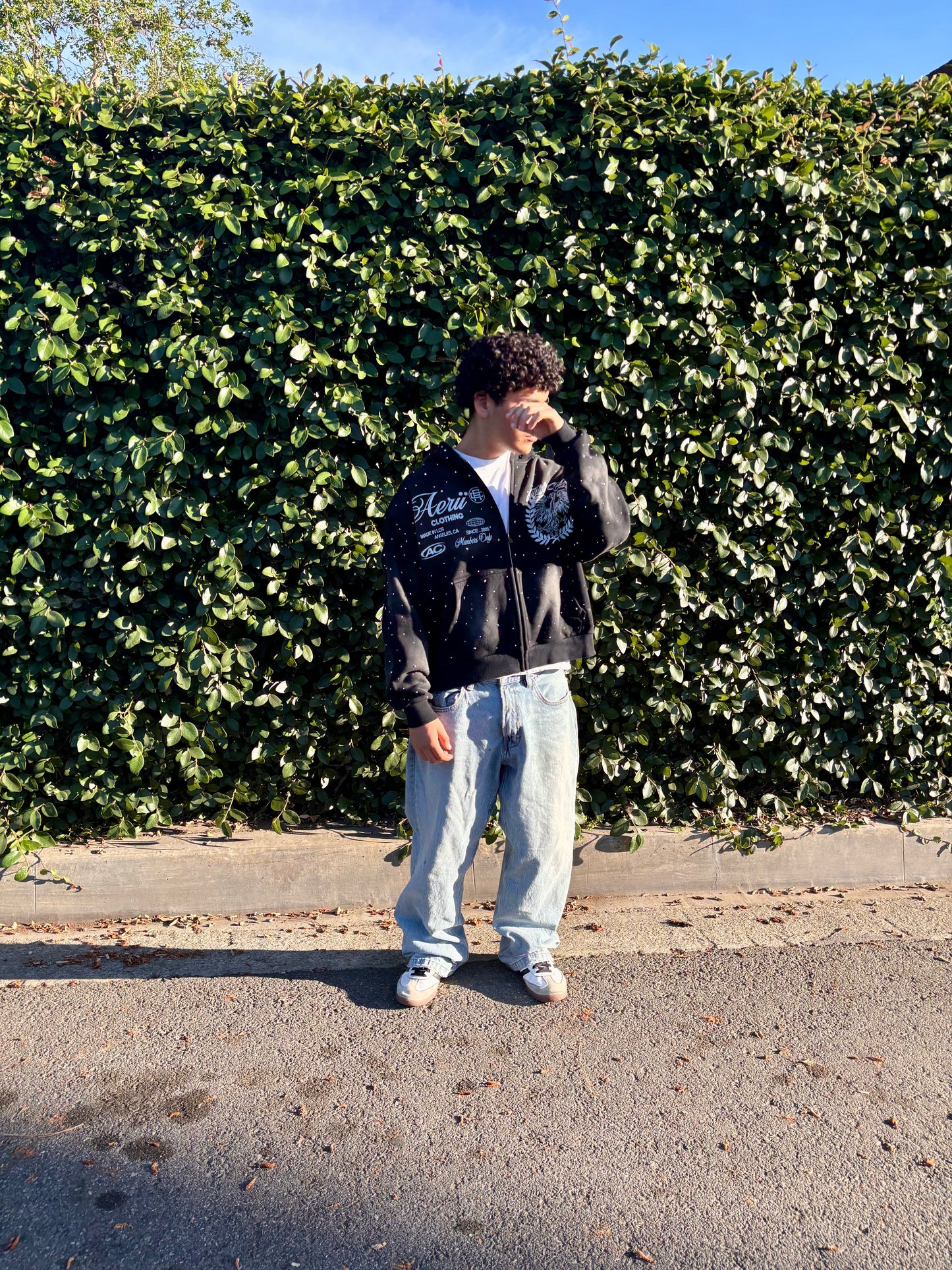 black aeri zip up