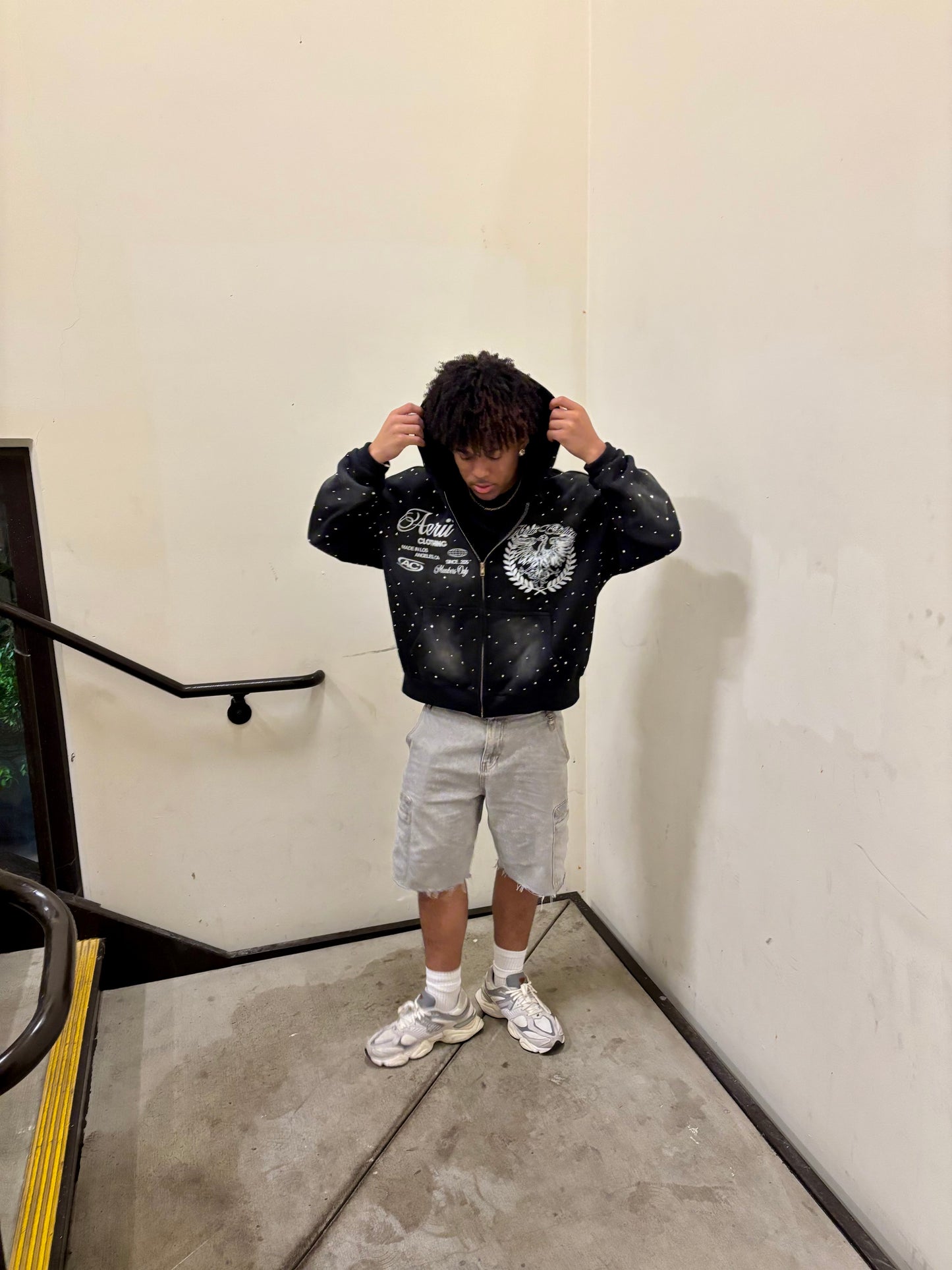 black aeri zip up